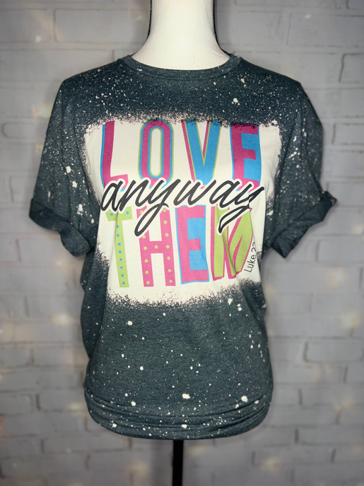 Black bleached graphic tee with multicolor “LOVE anyway” front print and large letters