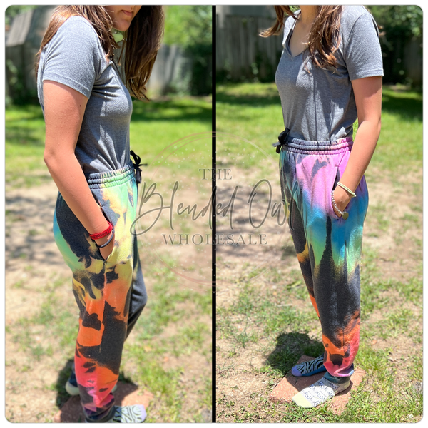 Rainbow burst tie-dye jogger pants with elastic waistband and drawstring cuffs