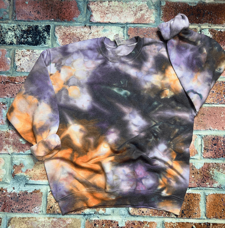 Ice tie-dye sweatshirt with purple and orange swirl pattern, crew neck and long sleeves