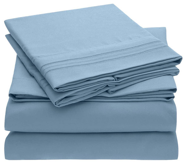 Light blue sheet set, stacked flat sheet and fitted sheet