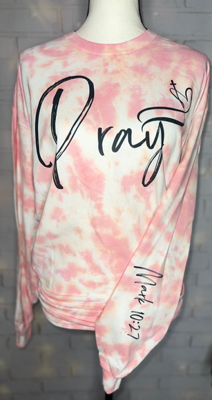 Coral tie-dye long sleeve tee with Pray graphic and Psalm 107:28-20