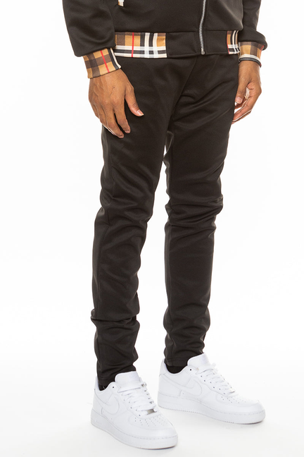 Black track pants with checkered stripe at cuffs and waistband