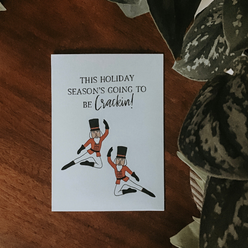 Holiday greeting card with nutcracker illustration and 'This holiday season's going to be Crackin!'