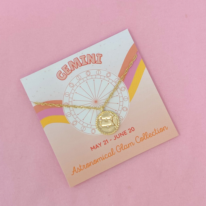 Gemini zodiac necklace card with gold chain and circular pendant, May 21–June 20