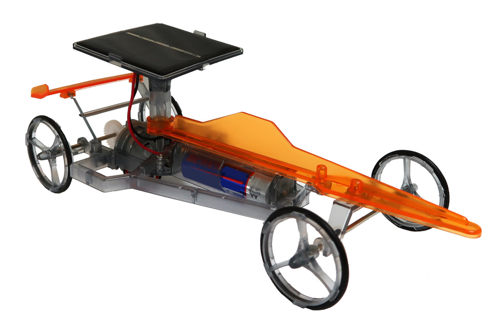 Orange top fuel dragster model with solar panel, battery compartment, and four black wheels