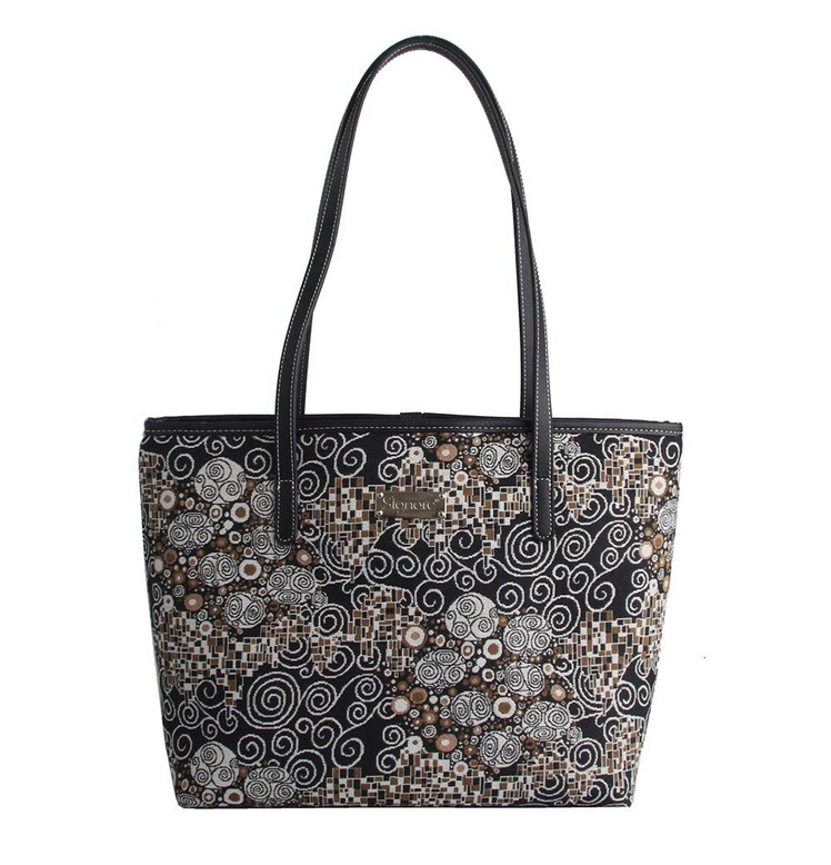 Printed shoulder tote bag with swirling geometric pattern and black handles