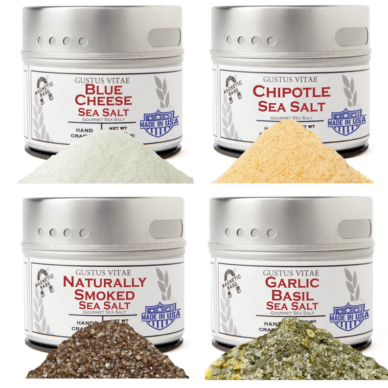 Set of four sea salt jars with assorted salt piles in front