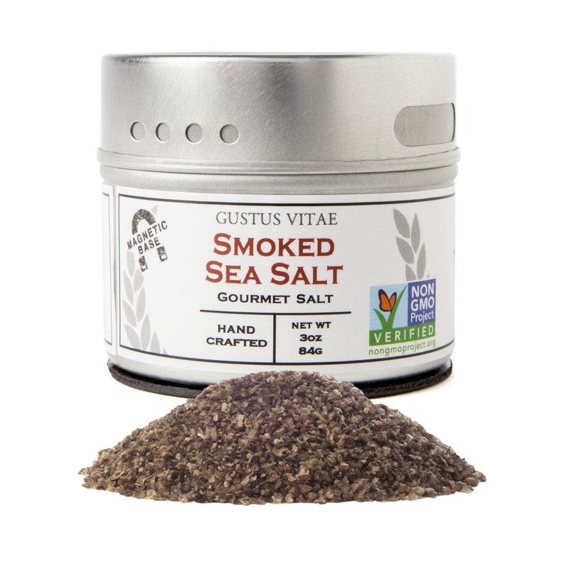 Smoked sea salt tin with dark gray powder mound