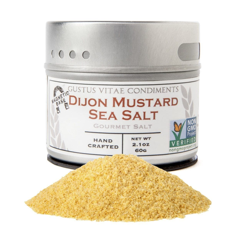 Dijon mustard sea salt tin with yellow powder mound
