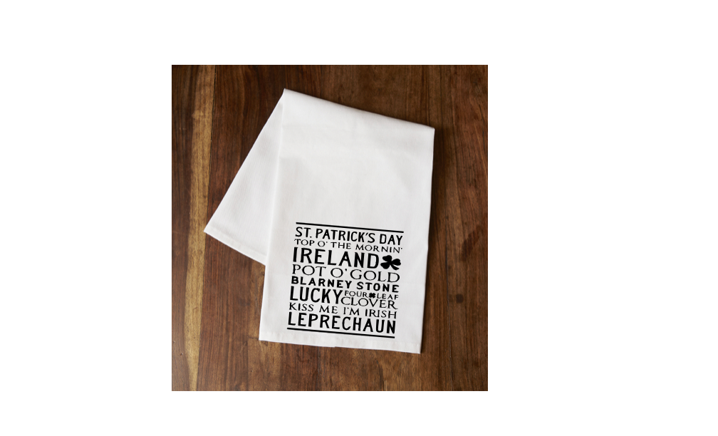 White tea towel with black Irish sayings and leprechaun graphic