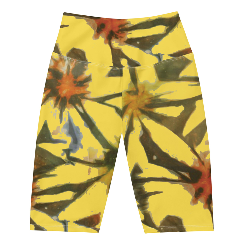 Yellow tie-dye biker shorts, mid-thigh length, flat lay front