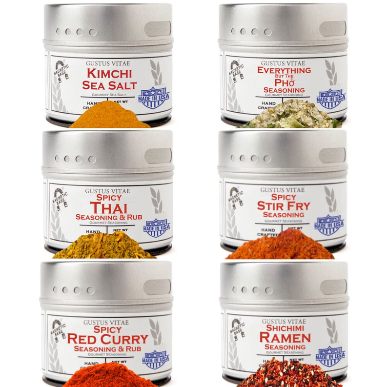 Set of six spice blend jars with silver caps and colorful printed labels