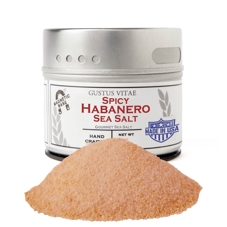 Spicy habanero sea salt jar with light pink seasoning pile in front