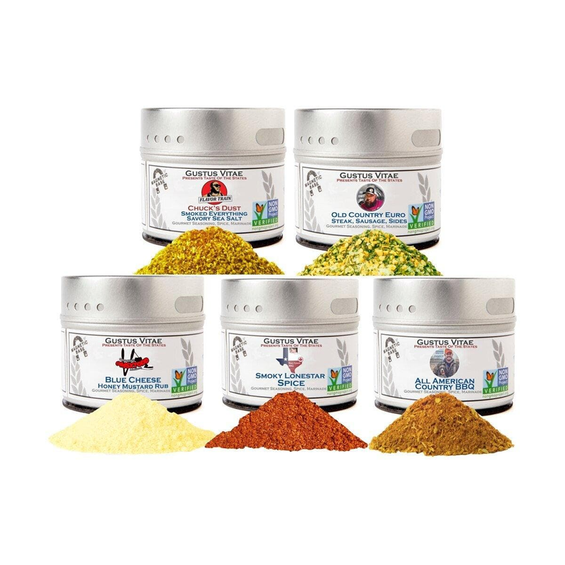 Four spice jars with assorted dried seasoning powders