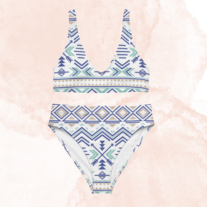 Triangle bikini top and high-waist bottoms in Aztec pattern, flat lay