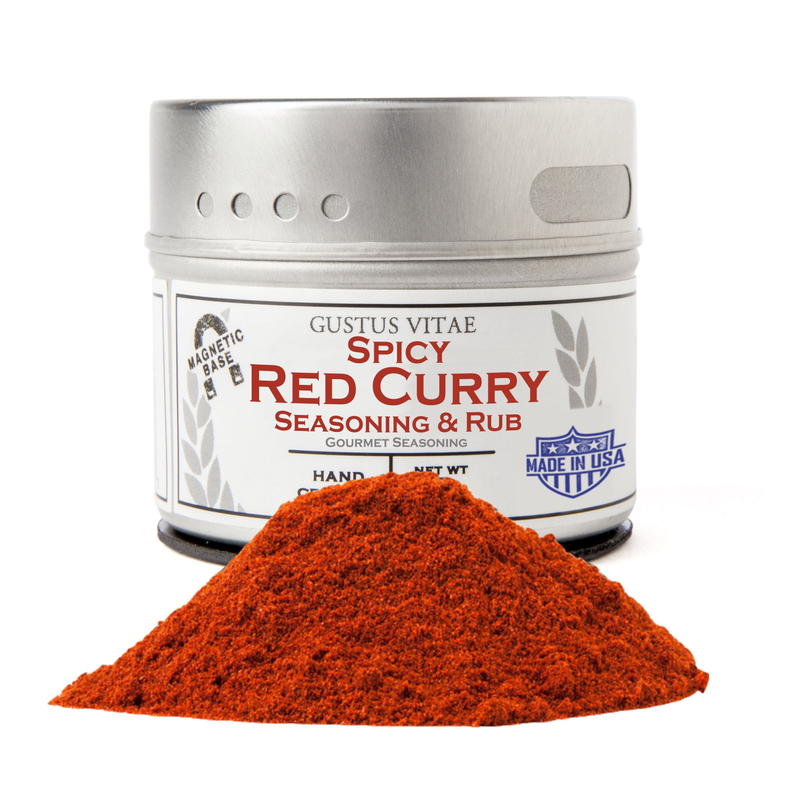 Spicy red curry seasoning jar with orange-red powder mound