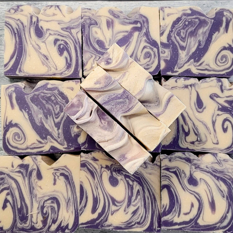 Stacked marbled lavender and cream artisan soap bars