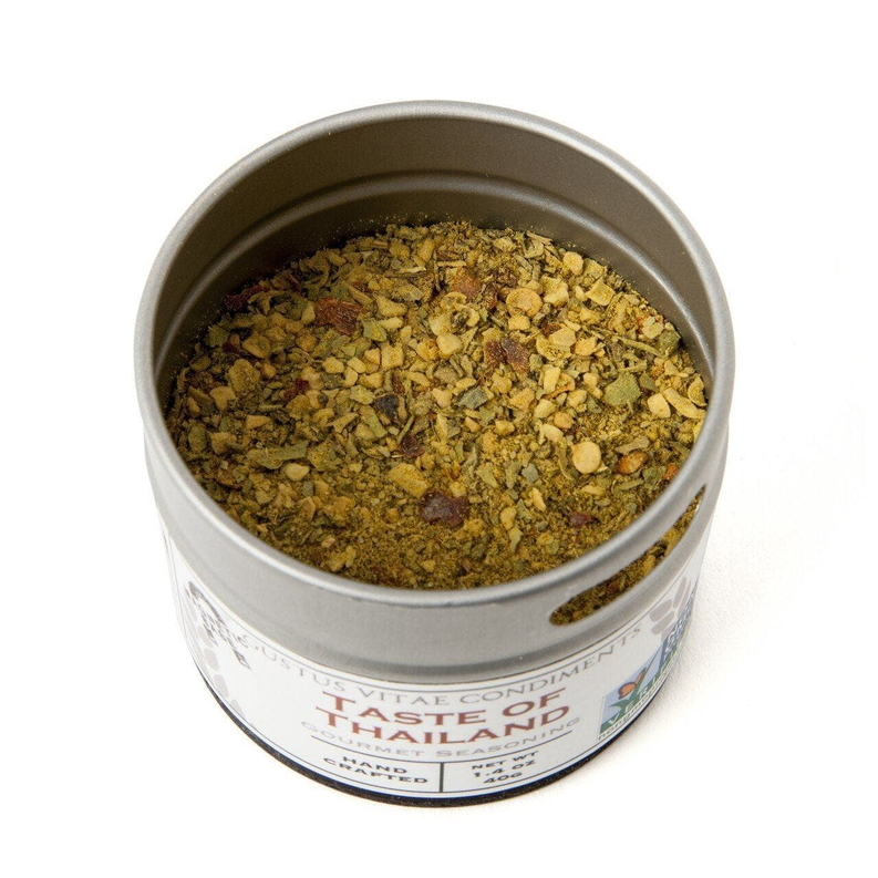 Thai seasoning tin filled with yellow-brown dried seasoning viewed from above