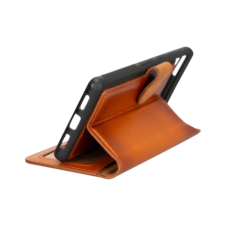 Tan leather wallet phone case with fold-over cover and stitched edges