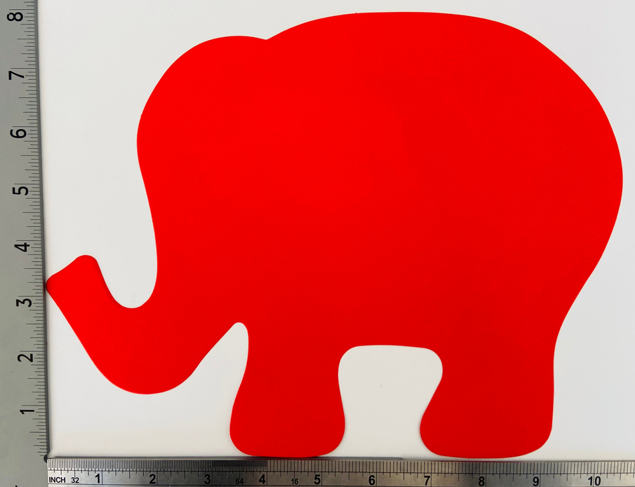 Red elephant-shaped craft cut-out with white notch at feet