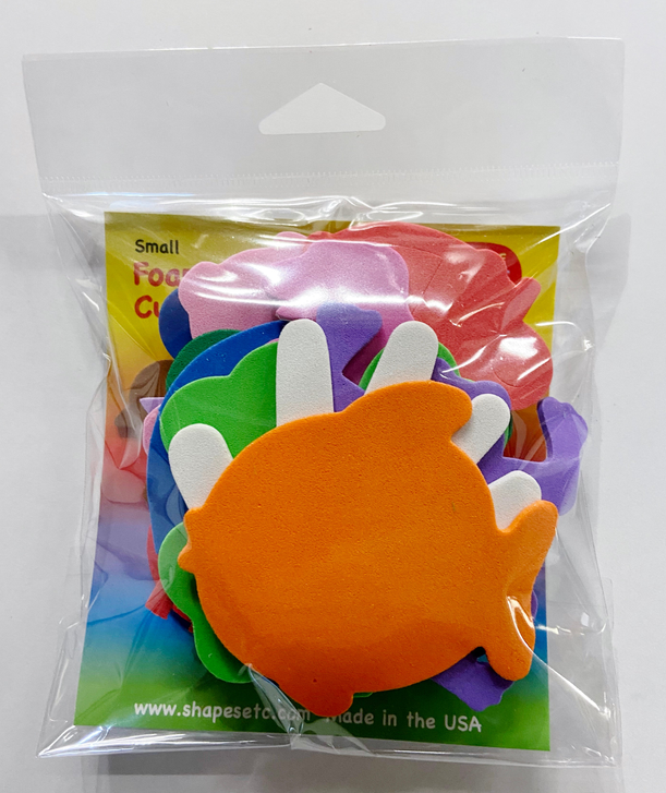 Assorted adhesive foam cut-outs in sealed bag, orange character in front
