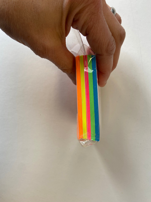 Assorted-color blank index cards, 2x3 inches, in a clear plastic sleeve