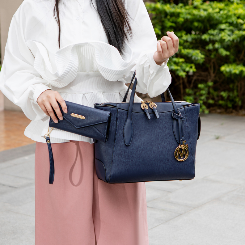 Dark vegan leather tote bag with wallet and top handles, gold-tone logo charm