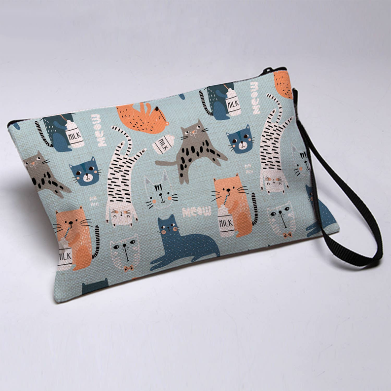 Light blue cat-print wristlet pouch with fabric wrist strap