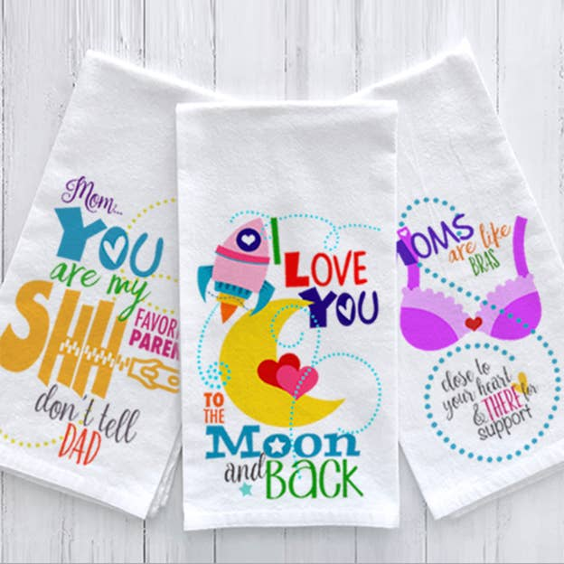 Three white hand towels with colorful “Mom/You are my favorite parent” text prints