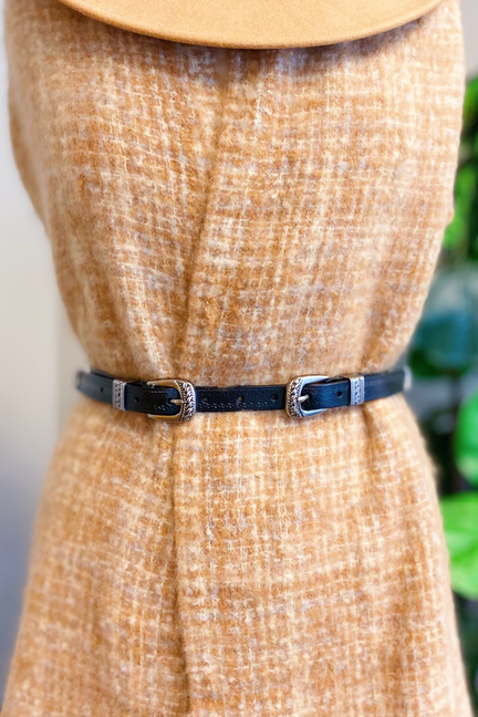 Double buckle leather belt with dark blue strap and silver-tone center buckle.