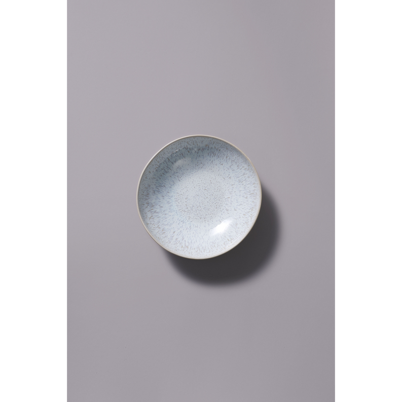 Round light blue sea plate with speckled glaze, glossy center