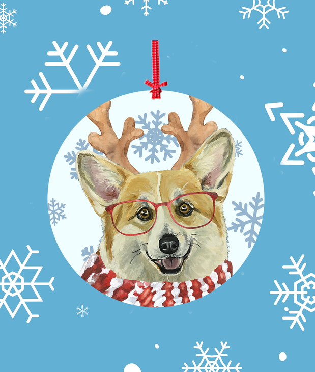 Christmas tree ornament with illustrated corgi face, red scarf, and antlers on round disc