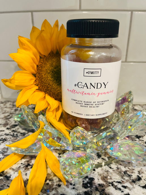#CANDY multivitamin gummies bottle with black cap, orange gummy candies