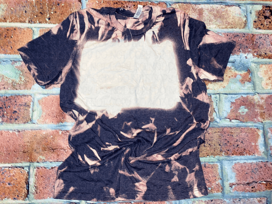Navy bleach-splatter T-shirt with crew neck, short sleeves, knotted hem twist