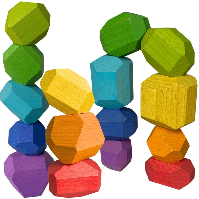 Close-up of multicolor wooden balancing stones grouped in a cluster