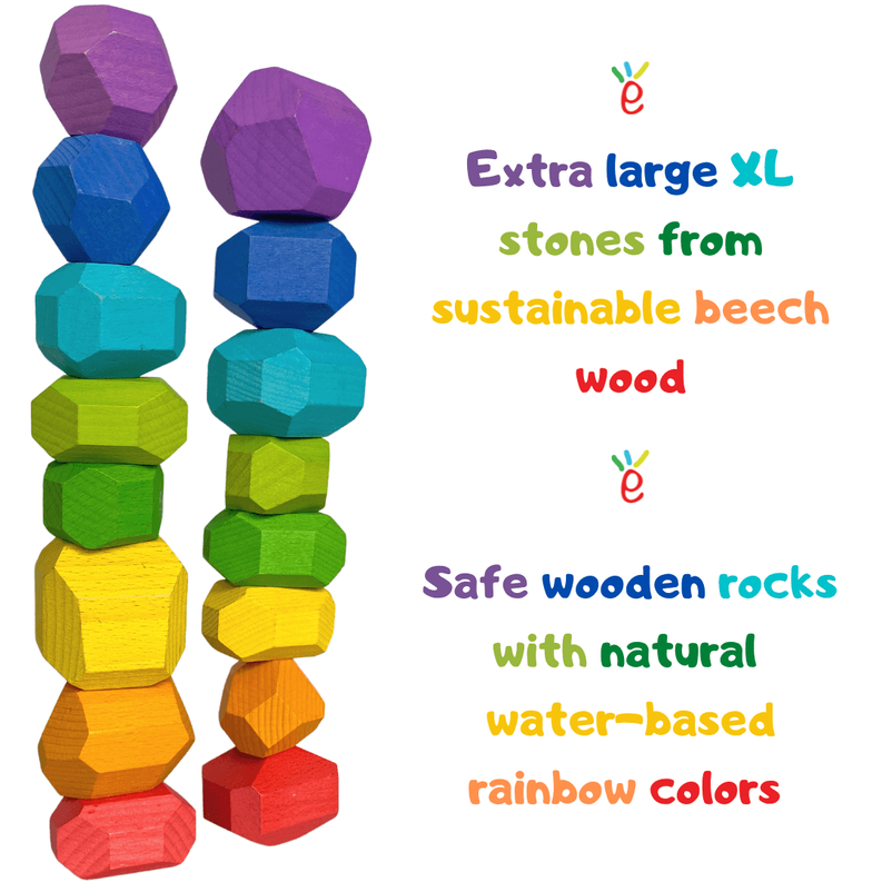 Assorted rainbow wooden balancing stones shown in color-stacked columns