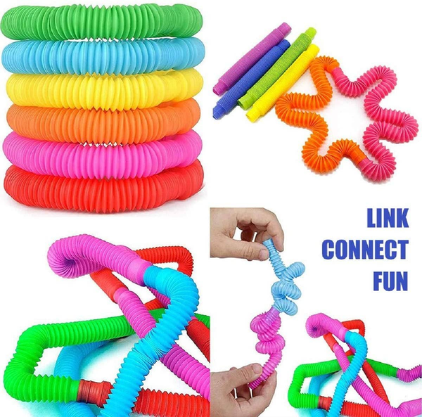 Stacked rainbow spring fidget toys with linked connectors, bright sensory set