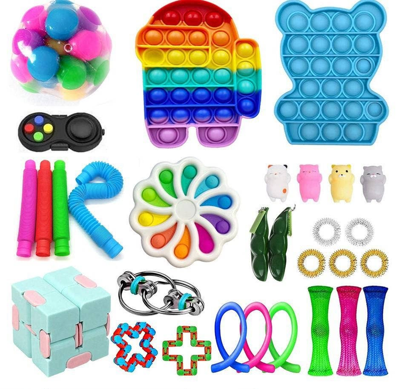 Assorted bright fidget toys: pop it, spinner, slinky, puzzle pieces and rings
