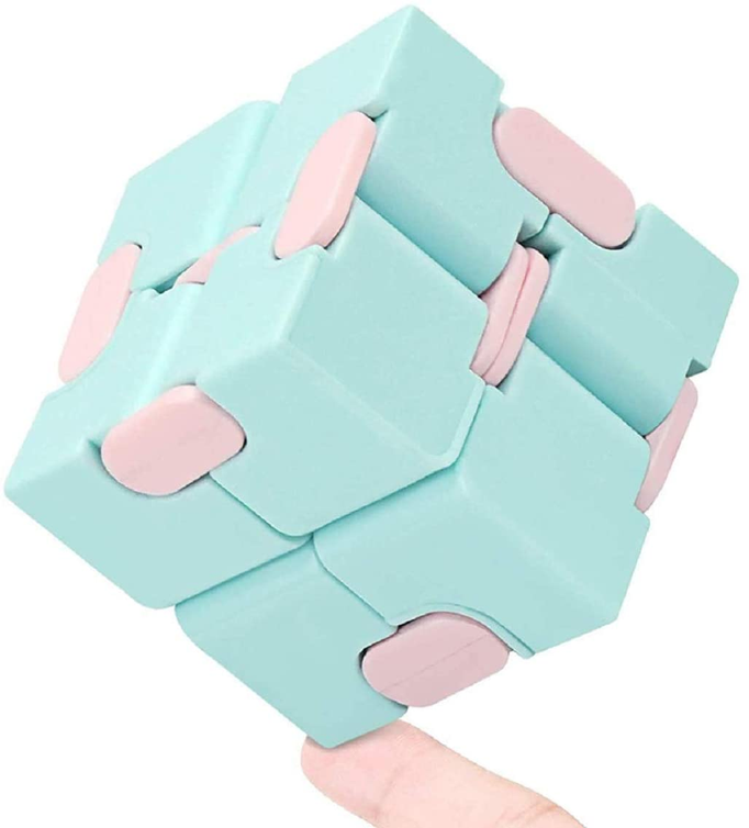 Light blue foam sensory puzzle set with pink hinge tabs, folded pieces