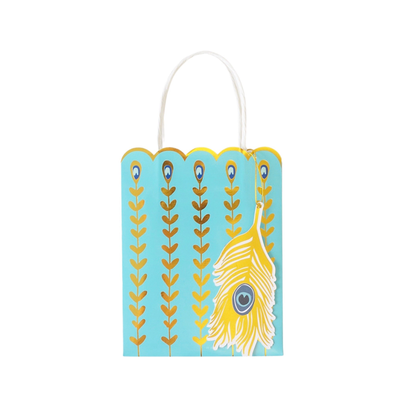 Teal feather gift bag with white rope handles and tropical floral pattern