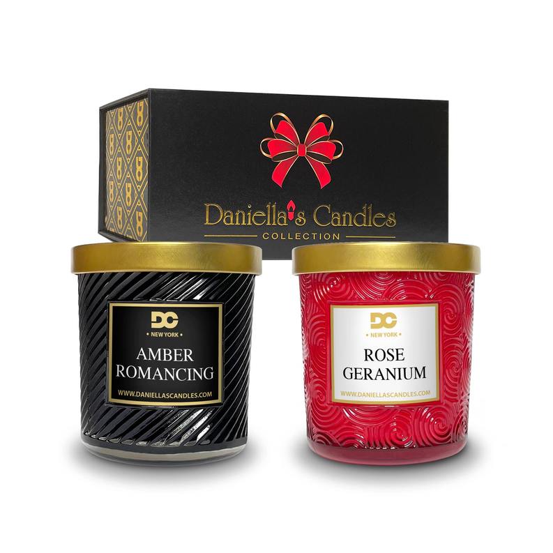 Two scented candles: amber romancing and rose geranium, in matching jar set