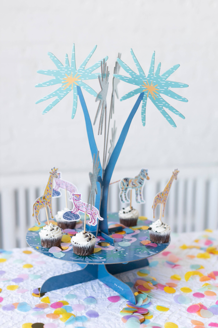 Safari themed cupcake stand with tree topper and multiple cupcakes with animal figures