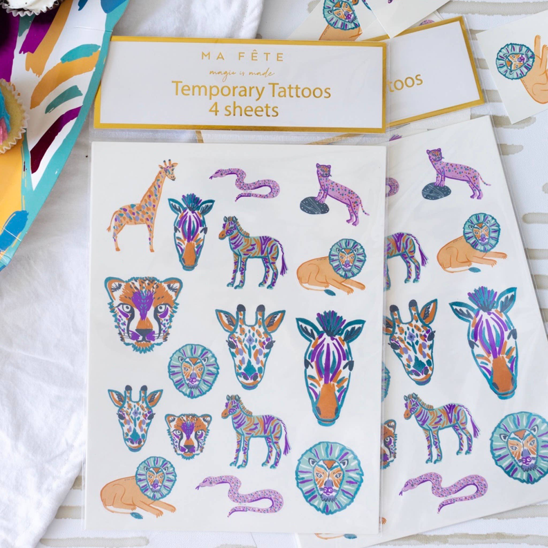 Temporary tattoo pack with 4 sheets featuring safari animals in blue, orange, and purple