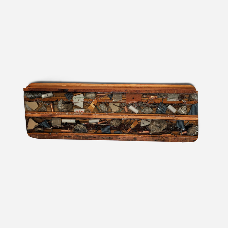 Rectangular wooden artwork with abstract metal and stone collage, front view.