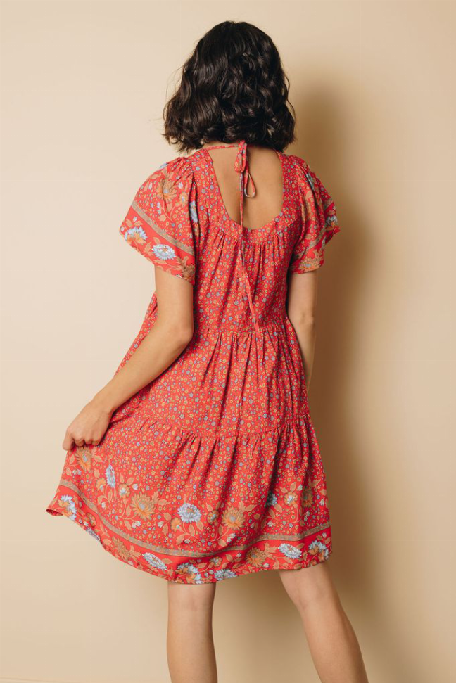 Red floral babydoll dress, open back with crisscross tie and ruffled tiers
