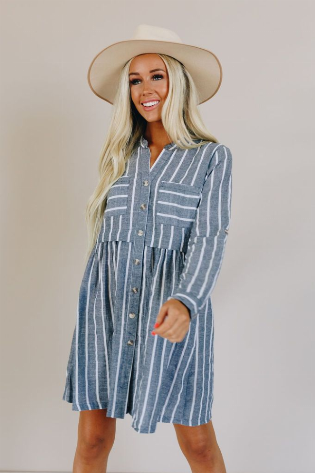 Blue and white striped button-front dress with chest pockets and long sleeves