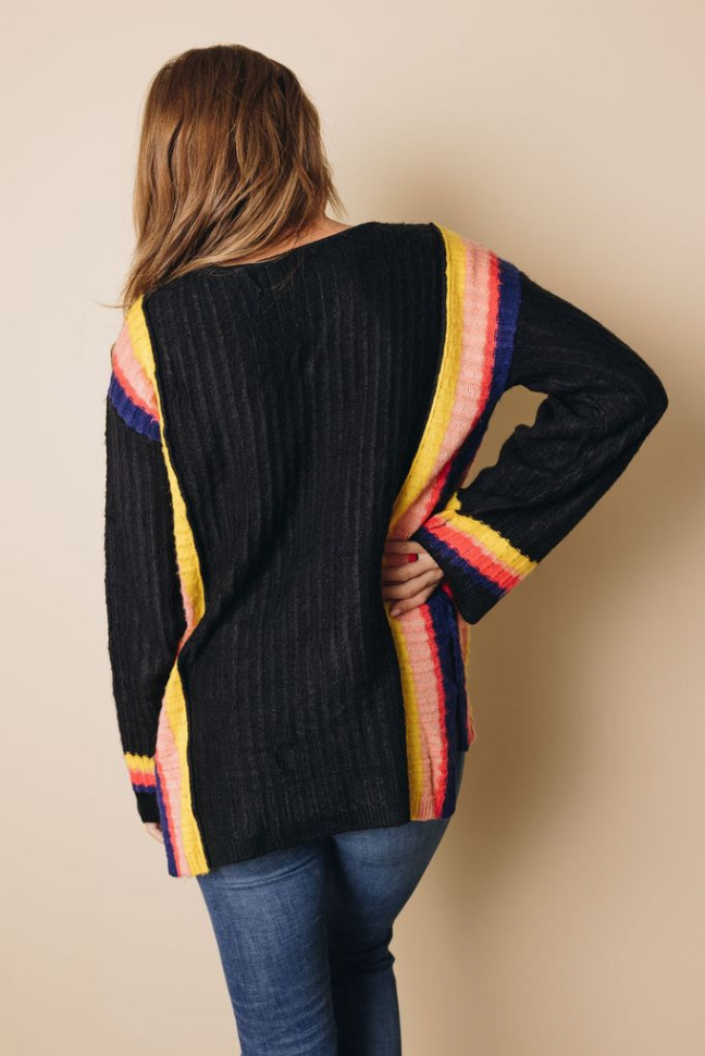 Black knit sweater back with rainbow vertical stripe and striped sleeves