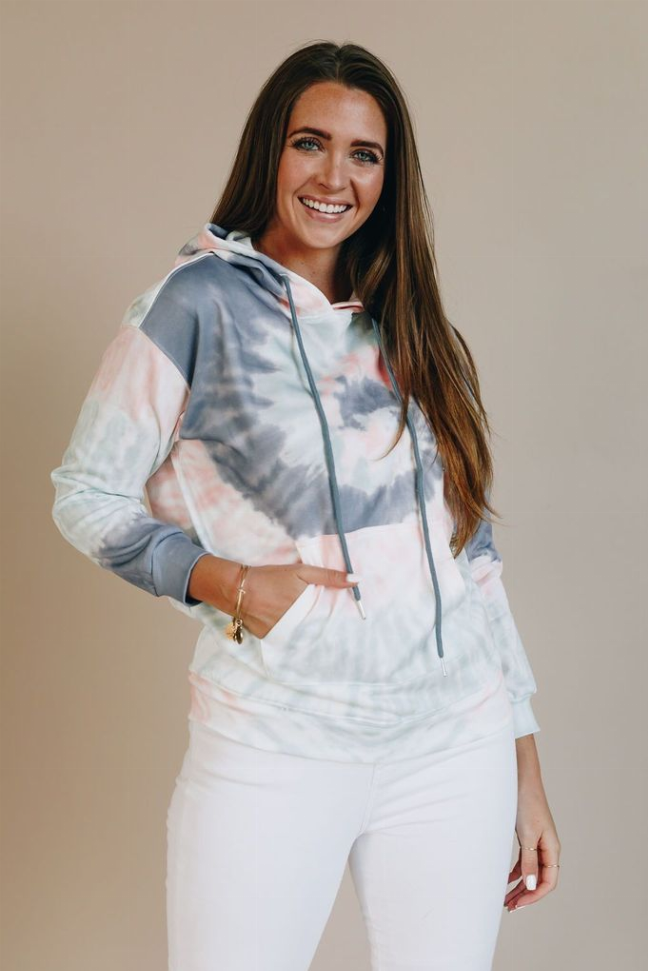 Tie-dye pullover hoodie with hood and drawstrings; blue and coral swirls on white