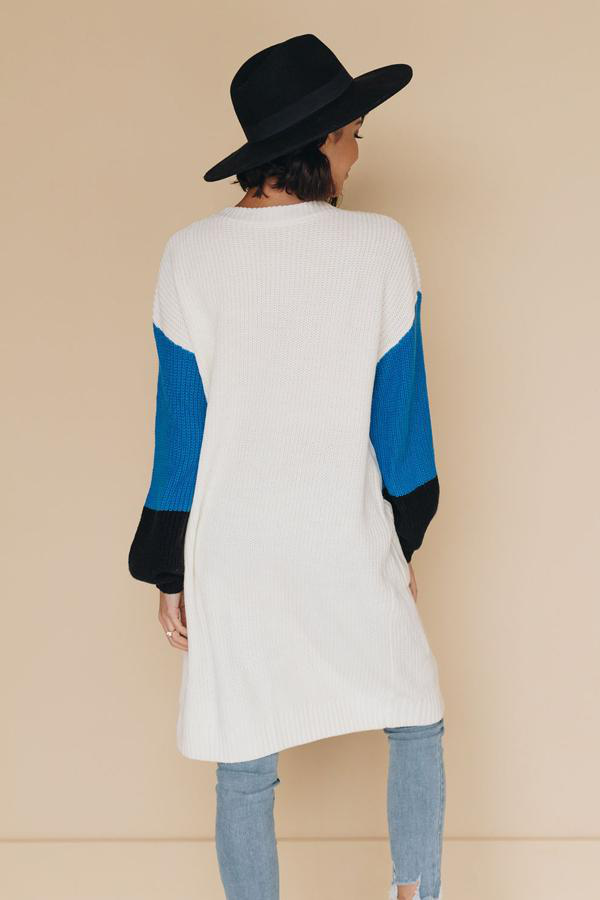 Long colorblock cardigan with open front, white body and blue sleeves