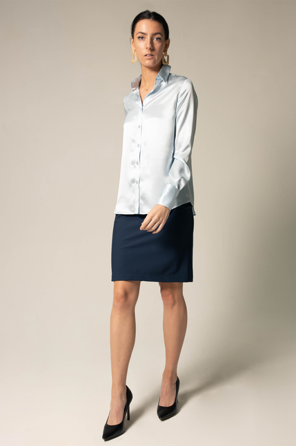 Light blue satin silk blouse with front buttons, pointed collar, and long sleeves